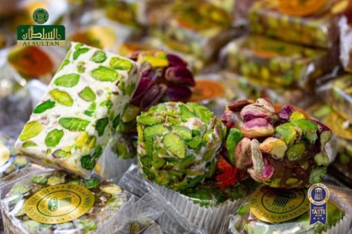 Picture of A mixture of salwa, araysia delight, and pistachio nougat
